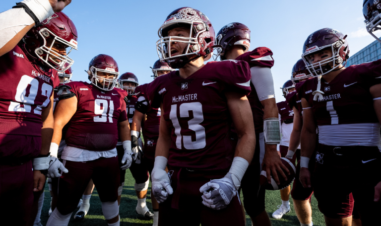 McMaster Marauders football team huddle