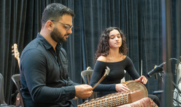 Students playing instruments during World Stage event.