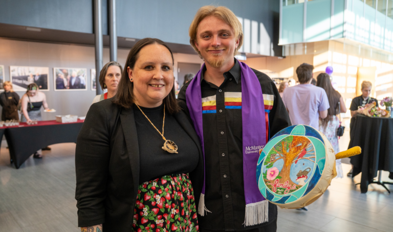 Indigenous Student Services Director Chrissy Doolittle and Seth Cabezas at Indigenous Graduate Celebration