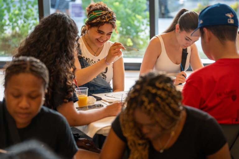 Students having fun during campus crafting event.