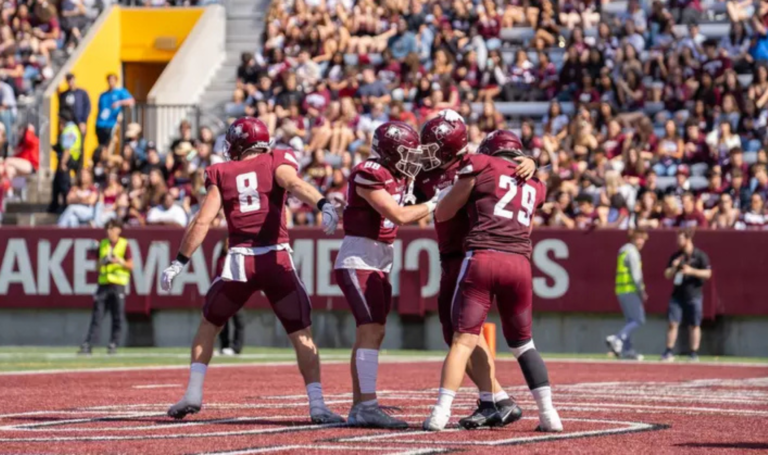 Marauders football team during Homecoming game.